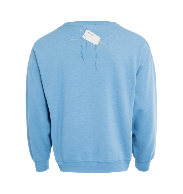 Image 2 of 4 - BLUE - This powder blue upcycled vintage sweatshirt features "1910" applique at the front and Transnomadica label at the back. 50% cotton / 50% polyester with the size XL on its original vintage label. Measurements: 23 inches in length from neckline to front hem, 25 inches from shoulder-to-shoulder, 25 inches from armpit-to-armpit, 22 inches from top sleeve seam to top of wrist.This collection of vintage sweatshirts, exclusively for 1910 at Hirshleifers, each featuring a hand-crafted 1910 a 