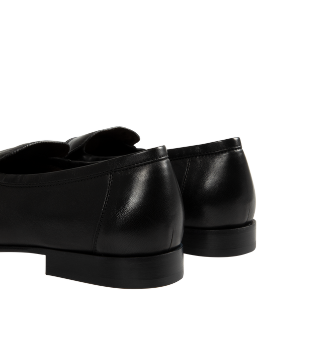 Image 3 of 4 - BLACK - THE ROW Soft Loafers featuring polished eel leather loafers, topstitching and gathering at moc toe, strap at vamp, logo stamp at footbed, suede lining, stacked leather block heel and hand-painted leather sole with rubber injections. Heel: H1". Leather. Made in Italy.