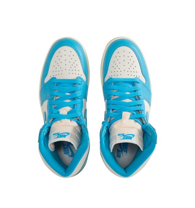 Image 5 of 5 - BLUE - JORDAN Air Jordan 1 Retro High OG Sneaker featuring high-top silhouette, genuine leather upper, classic Wings logo stamped on collar and a stitched-down Swoosh logo for heritage style, encapsulated Air-Sole units and rubber outsole.