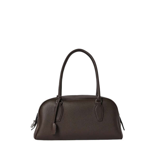 Image 1 of 3 - BROWN - THE ROW E/W India Bag featuring bowling bag in textured calfskin leather with elongated silhouette, extended tubular handles, piping, branded metal padlock and key and top zipper closure. 13.4 x 6.7 x 5.3 in. Antique silver hardware finishing. 100% calfskin leather. Lined in 100% lambskin leather. Made in Italy.