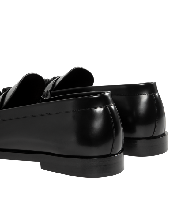 Image 3 of 4 - BLACK - THE ROW Loafers featuring tassel detail at strap, ruched welt stitching and box calf leather upper and sole. Made in Italy.