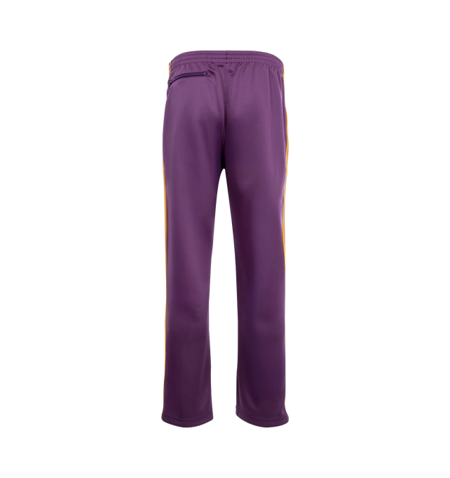 Image 2 of 3 - PURPLE - NEEDLES Track Pants featuring polyester interlock jersey, concealed drawstring at elasticized waistband, three-pocket styling, pinched seams and embroidered logo graphic at front and striped knit trim at outseams. 100% polyester. Made in Japan.