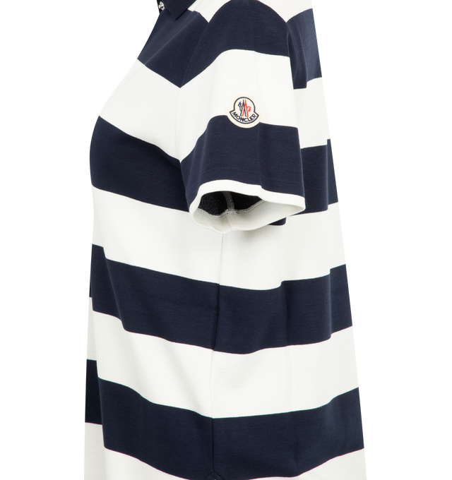 Image 3 of 3 - NAVY - MONCLER Striped Polo Shirt featuring woven viscose, collar, short sleeves and snap button closure. 90% viscose/rayon, 8% polyamide/nylon, 2% elastane/spandex.