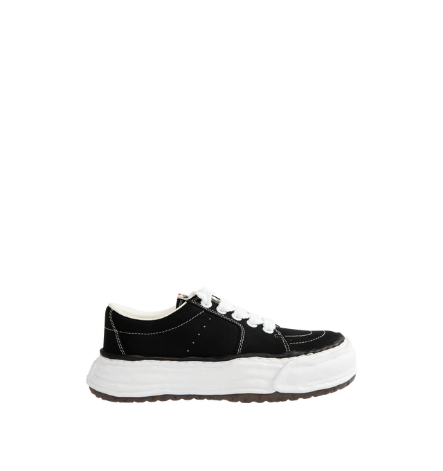 Image 1 of 5 - BLACK - Maison Mihara Yasuhiro Men's Eric Sneakers feature the brand's signature hand-sculpted OG sole, a mixed-material suede and canvas upper, and distinctive toe stitching for a bold contemporary look. Designed for the Spring/Summer 2026 collection, these designer low-top sneakers combine Maison Mihara Yasuhiro's experimental aesthetic with everyday comfort, while the handcrafted-inspired sole and intentional vintage detailing create a truly distinctive silhouette. Main Material: Cow Leath
