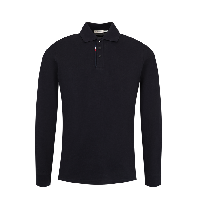 Image 1 of 1 - BLUE - Moncler Men's Logo Cotton Piquet Polo Shirt is crafted from pure cotton piquet and features a timeless long-sleeve silhouette elevated with subtle signature detailing. Cut in a regular fit, this designer polo features a tonal ribbed collar and cuffs, tricolor piping along the button placket, and a signature Moncler logo patch. Main Material: 100% Cotton. Collar and Cuffs: 99% Cotton, 1% Elastane/Spandex. Fit: Regular. Closure: Button Front. Made in Turkey.
