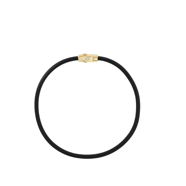 Image 1 of 2 - GOLD - Uniform Object Carbon Torque Necklace featuring 14 g of 18K yellow gold with 0.37 TCW oval diamonds and 0.67 TCW round diamonds. Length: 15". Handcrafted in New York City. Features an Italian-made hypoallergenic rubber band designed for comfort and durability. Hirshleifers offers a range of pieces from this collection in-store. For personal consultation and detailed information about jewelry, please contact our dedicated stylist team at personalshopping@hirshleifers.com.
