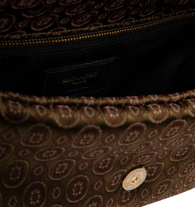 Image 4 of 4 - BROWN - SAINT LAURENT Calypso Small Bag featuring supple bag in medallion jacquard, decorated with the cassandre, sliding chain strap, cotton lining, bronze-tone hardware, magnetic snap closure and one zip pocket. 10.2 x 5.5 x 2.7 inches. Handle drop: 10.620.1 inches. Acetate, viscose, polyester, metal. Made in Italy.