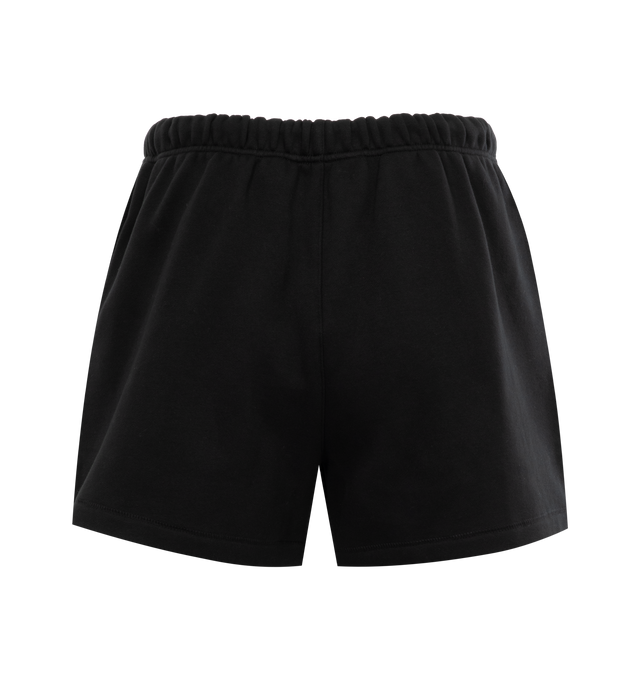 Image 2 of 3 - BLACK - FEAR OF GOD ESSENTIALS Running Short featuring cropped length, an encased elastic waistband with elongated drawstrings, side seam pockets and a rubberized label at the center front. 80% cotton, 20% polyester.  