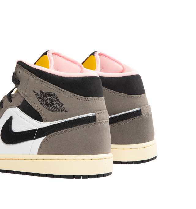 Image 3 of 5 - GREY - JORDAN Air Jordan 1 Mid SE Sneaker featuring genuine leather in the upper, Nike Air technology, soft foam midsole, rubber outsole, Jumpman on the tongue and wings logo on the collar.