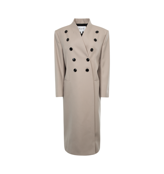 Image 1 of 3 - NEUTRAL - ALAIA Large Coat featuring buttons in a v shape, horn buttons, signature alaa upstitching, v neck and made from japanese wool gabardine. 100% virgin wool. Made in Italy 