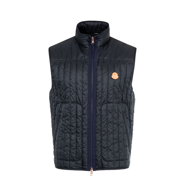 Image 1 of 2 - NAVY - Moncler x Gilga Farm Designed by Donald Glover Tangerine Down Vest featuring longue saison lining, down-filled, zipper closure with ribbon trim, zipped pockets and logo patch. 100% polyamide/nylon. Padding: 90% down, 10% feather. Made in Romania.
