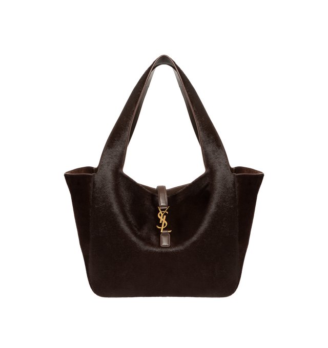 Image 1 of 3 - BROWN - SAINT LAURENT Le 5 7 Bea in pony hair leather featuring lightweight and fully lined in tonal suede, inner zip pocket, leather tab closure, an east/west format, inner ties that allow the sides to be collapsed or expanded and bronze-tone hardware. 19.7" x 11" x 7.1". Calfskin leather. Made in Italy.