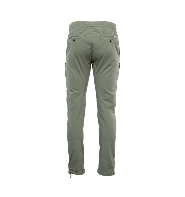 Image 2 of 4 - GREEN - C.P. COMPANY Microreps Cargo Track Pants featuring zip fly and button fastening, slant pockets, secure utility pockets at front and back welt pockets. 100% cotton. 