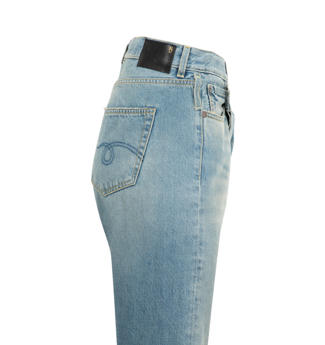 Image 3 of 3 - BLUE - R13 Crossover Jeans featuring fading, whiskering, and distressing throughout, belt loops, five-pocket styling, offset button-fly, raw edge at rolled cuffs and logo patch at back waistband. 100% cotton. Made in Italy.
