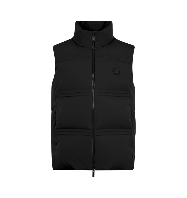 Image 1 of 3 - BLACK - Moncler x A$AP Rocky Sparky Down Vest featuring 2L 4-way stretch nylon, nylon laqu lining, down-filled, zipper closure, zipped pockets, embossed details and logo patches. 87% polyamide/nylon, 13% elastane/spandex. Padding: 90% down, 10% feather.