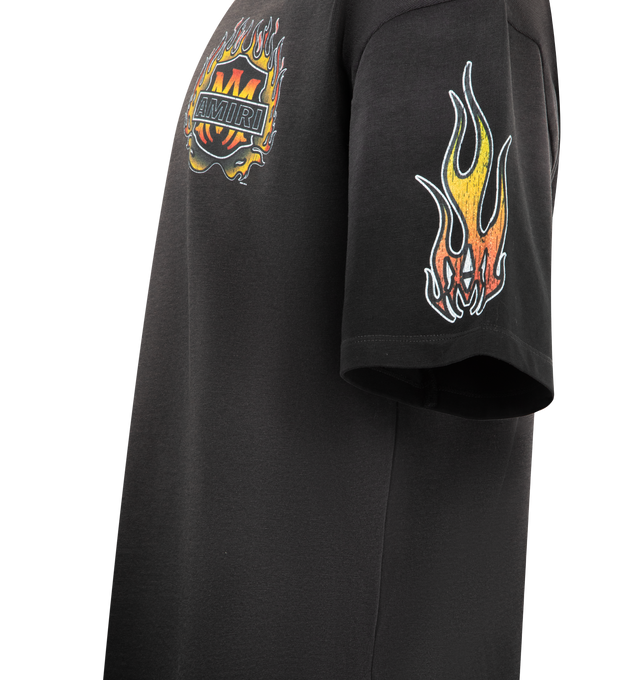 Image 3 of 3 - BLACK - AMIRI MA Flames Tee featuring fading throughout, rib-knit crewneck, logo graphic printed at chest, sleeves, and back and dropped shoulders. 100% cotton. Made in Italy.