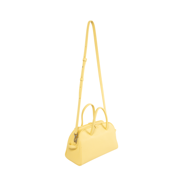 Image 2 of 3 - YELLOW - JACQUEMUS Turismo Small Bag featuring small soft bowling bag, gained leather, two-way zip closure, inside pocket, detachable and adjustable shoulder strap and bow detail. 26 cm x 16 cm x 11 cm. 100% calfskin. Made in Italy.