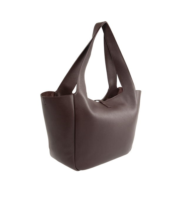 Image 2 of 3 - BROWN - SAINT LAURENT Le 5 7 Bea Bag in grained leather, lightweight, fully lined in tonal suede, inner zip pocket, leather tab closure, an east/west format with inner ties allow the sides to be collapsed or expanded to create different silhouettes. 19.7" x 11" x 7.1". Calfskin. Made in Italy.