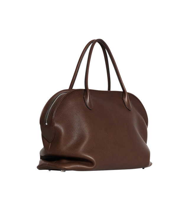 Image 2 of 3 - BROWN - THE ROW Agnes 15 Bag featuring softly structured top-handle bag in grained saddle leather with tubular handles, gusseted side folds, flat base, and curved top zipper closure. 17.52 x 9.85 x 8.66 in. 100% calfskin leather. Made in Italy.