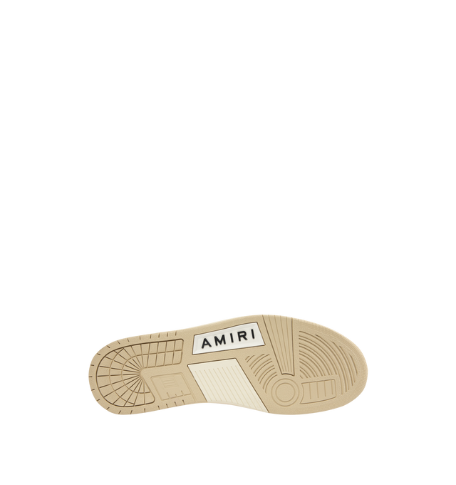 Image 4 of 5 - BROWN - AMIRI Skel Top Low Sneakers featuring low-top grained leather and cotton twill sneakers, perforations at toe, logo patch at padded tongue, padded collar, graphic appliqus at sides and logo printed at heel tab. Upper: leather, textile. Sole: rubber.