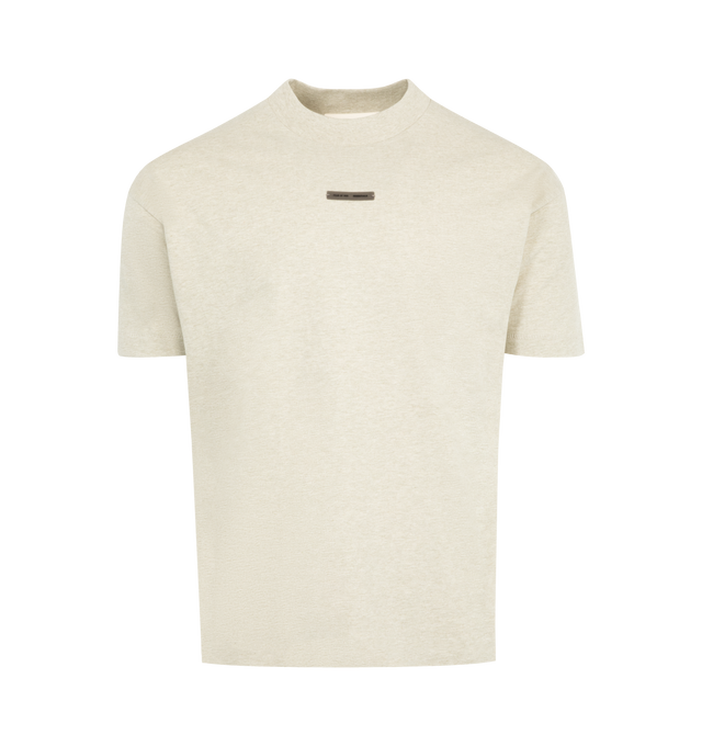 Image 1 of 2 - NEUTRAL - FEAR OF GOD ESSENTIALS Classic Tee featuring medium-weight cotton jersey, rib-knit crewneck, classic fit, signature Fear of God relaxed proportions, translucent rubberized label at the center front and a new "Essentials Fear of God" beveled metallic logo across the back. 100% cotton.