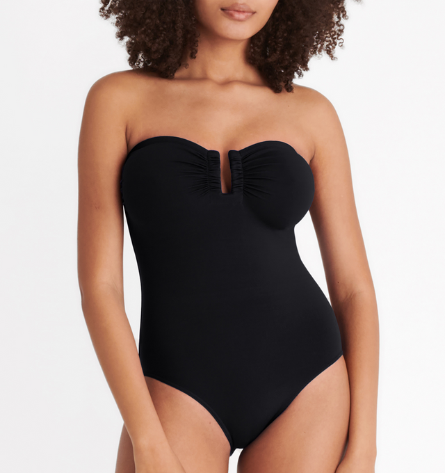 Image 4 of 6 - BLACK - ERES Cassiope One-Piece Bustier Swimsuit featuring bust shirring at front and sides, U-shaped metal link between cups and gripper tape. Main: 84% Polyamid, 16% Spandex. Second: 68% Polyamid, 32% Spandex. Made in Italy. 