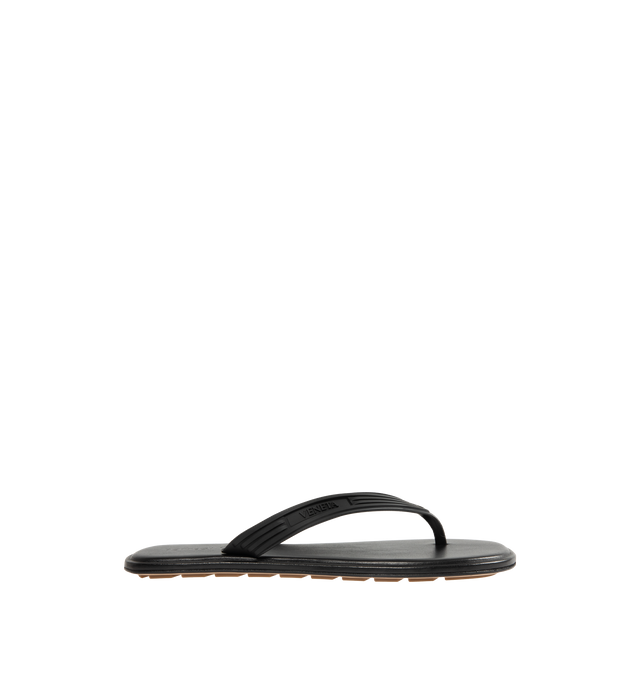 Image 1 of 5 - BLACK - BOTTEGA VENETA Sampieri Thong featuring rubber thong sandal with leather insole. Lining: lambskin. Rubber-injected leather outsole. Thermoplastic polyurethane. Made in Italy.