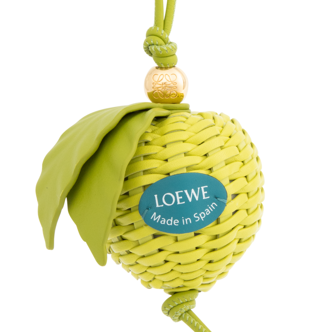 Image 2 of 2 - GREEN - Loewe Granny Apple charm in woven cord on a looped calfskin strap with an Anagram Pebble dice. 31.5 cm x 6.5 cm. Made in Spain.