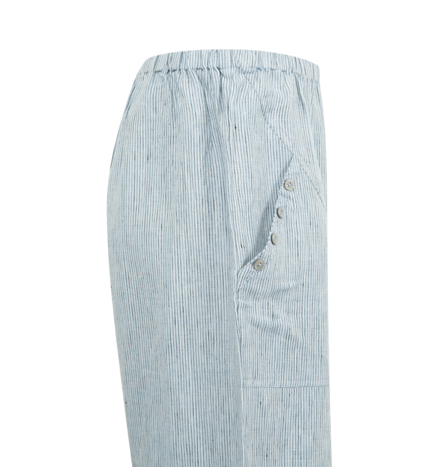 Image 3 of 3 - BLUE - DEIJI STUDIOS Angle Pocket Pant featuring a relaxed low to mid rise, ankle length pant features a soft minimal elastic waist and front seam pockets with button detail in a straight leg. 100% GOTS certified organic, OEKO-TEX 100 certified and EU certified stone washed French linen.