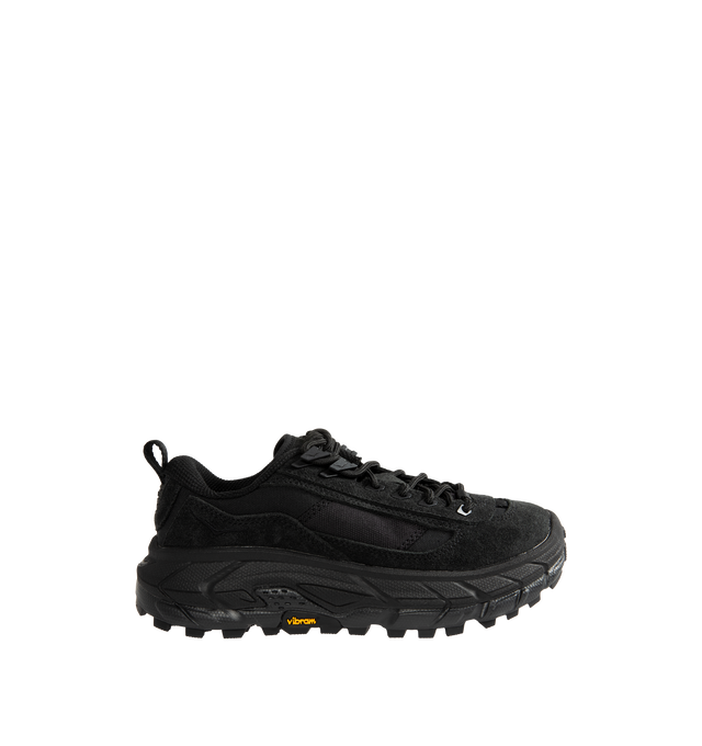 Image 1 of 5 - BLACK - Hoka Unisex Tor Summit FLD Sneakers are crafted from premium nubuck leather and feature a rugged outdoor-inspired silhouette. Designed with metal eyelets, a rubber mud guard, and a secondary lace system for enhanced functionality, they are finished with a Vibram Megagrip outsole for reliable traction. Main Material: Leather and Textile. Sole: Rubber. *Unisex style in men's sizing.