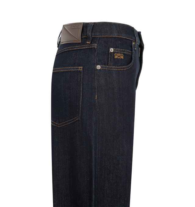 Image 3 of 3 - BLUE - Loewe Women's Jeans are crafted from lightweight stretch cotton denim and feature a slim-fit silhouette with a regular length. Designed with a mid-rise waist, tapered leg, classic five-pocket construction, concealed zip fly, and a puffy LOEWE embossed leather patch at the back. Main Material: 98% Cotton, 2% Elastane. Made in Italy.