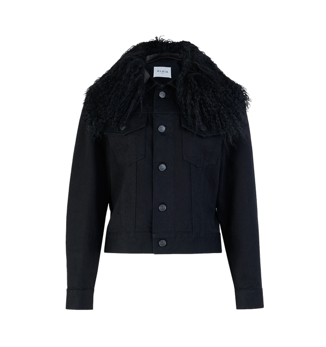 Image 1 of 1 - BLACK - Alaa women's Trucker Jacket In Black Denim is crafted from cotton with a hint of stretch for comfort and shape retention. The design features a front button closure, a midweight denim construction, and a luxurious lamb shearling collar for added texture and warmth. Self: 99% cotton, 1% polyurethane. Collar: 100% lamb shearling (ovis aries aries). Made in Italy.