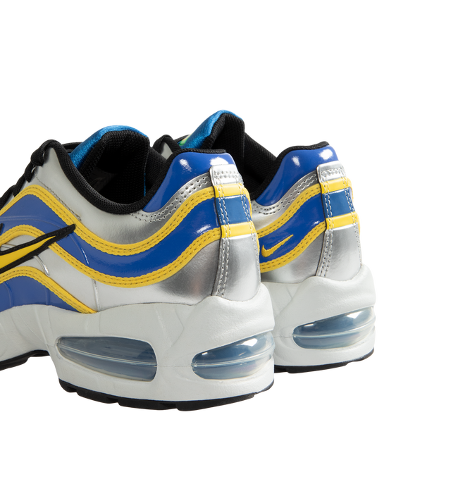 Image 3 of 5 - MULTI - Nike Air Max Joga Bonito R9 Sneakers feature a smooth synthetic leather upper inspired by Ronaldo Nazrio's iconic Mercurial R9 soccer boot and the original 2006 "Joga Bonito" collection. These lifestyle sneakers combine visible Max Air cushioning with a lightweight foam midsole and durable rubber outsole for all-day comfort, responsive support, and heritage-inspired style. Main Material: Synthetic Leather. Midsole: Foam with Visible Max Air Unit. Sole: Rubber.