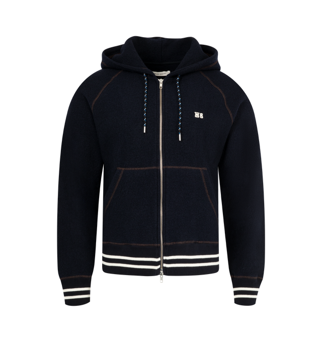 Image 1 of 2 - NAVY - WALES BONNER October Hoodie featuring full zip hoodie in navy wool with rust brown topstitching, contrast striped ribs and a jacquard drawstring. 100% wool.