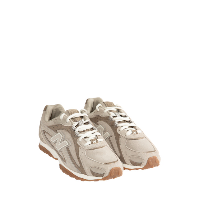 Image 2 of 5 - NEUTRAL - New Balance 204L Unisex sneaker featuring a low-profile silhouette, slim structure of '70s running shoes, tech-inspired texture of premium suede, multi-piece upper with embossed overlay, double-stacked suede 'N' logo, and screen-printed graphics along the saddle. Distinctive outsole with 2000s-inspired strike path and 70s-influenced tread pattern. Outer: Calf Suede 100%, Lining: Fabric 100%, Sole: Polyethylene vinyl acetate (PEVA) 100%. Made in Vietnam. *Unisex style in men's sizing
