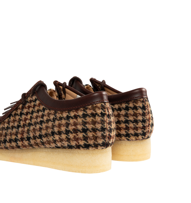 Image 3 of 4 - BROWN - CLARKS Wallabee Shoe featuring Harris Tweed upper, leather collar, apron binding, moccasin construction, brown round waxed lace with tassel aglets, Clarks Originals Leather and 200 years FOBS, Harris Tweed woven label inside quarter, Clarks Originals woven sock label and crepe rubber outsole.