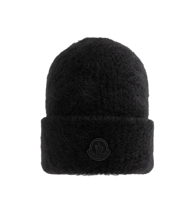 Image 1 of 2 - BLACK - MONCLER Mohair & Wool Blend Beanie featuring stockinette stitch, gauge 5 and a subtle ton-sur-ton logo patch. 50% mohair, 32% polyamide/nylon, 18% wool. Made in Italy.