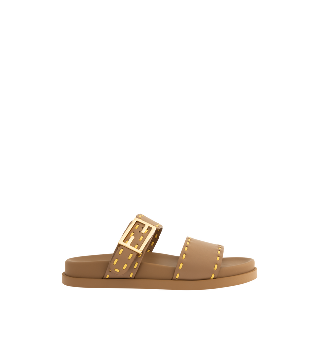 Image 1 of 4 - BROWN - FENDI Feel Slide Sandal featuring double-band flat slides with FF Baguette decorative buckle, hand-sewn contrasting macro Selleria topstitches and gold-finish metalware. 100% calfskin. Made in Italy.