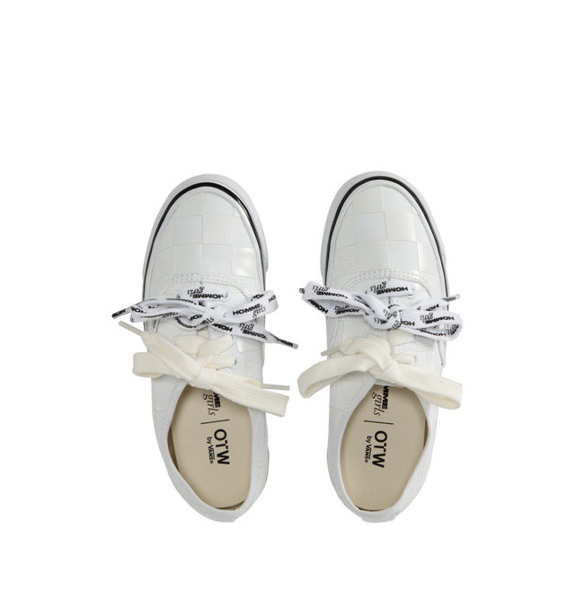 Image 5 of 5 - WHITE - VANS X HOMME GIRLS OTW Authentic 44 Sneaker featuring Heritage low-top shoe, Style 44, 8 oz canvas upper with 6 oz canvas bindings and heel strip, HommeGirls branded lace, with optional second lace, metal eyelets, higher sidewall with gloss finish, foxing tape, reinforced outsoles, Co-branded Foam ADC (All-Day Comfort) insole, signature waffle outsole pattern, all-over checkerboard pattern with Hg monograms and co-branded logo heel scab.