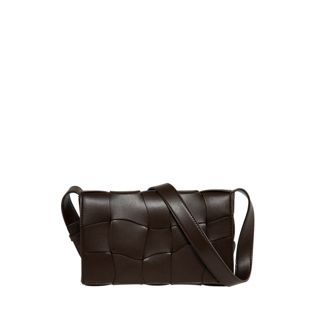 Image 1 of 3 - BROWN - BOTTEGA VENETA WAVED LEATHER CASSETTE CROSSBODY BAG with adjustable crossbody strap, magnetic fastening front flap closure, all-over intrecciato weave and one main compartment. 100% Leather. 