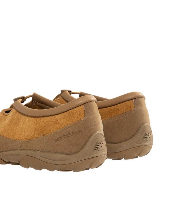 Image 3 of 5 - BROWN - NEW BALANCE MT10T Shoe featuring smooth cow leather upper with a pigskin nubuck outer surface, leather collar, Vibram outsole, rubber mudguard, rounded lugs for multi-directional traction and decorative toggle lace.