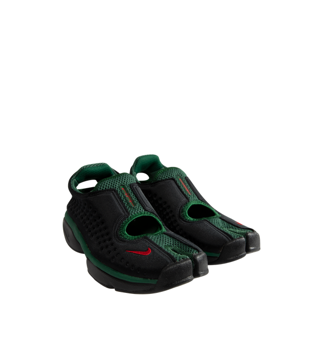 Image 3 of 5 - BLACK - Nike Women's Air Rift 2 Kenya Sneakers reinterpret the iconic split-toe silhouette with a colorway inspired by Kenya and its renowned running heritage. Designed in black, Fire Red, and Team Dark Green, these sneakers reference the colors of the Kenyan flag while honoring the barefoot running traditions that originally influenced the Air Rift design. The updated Air Rift 2 construction retains the distinctive split-toe profile and natural-motion-inspired shape while refining the origin