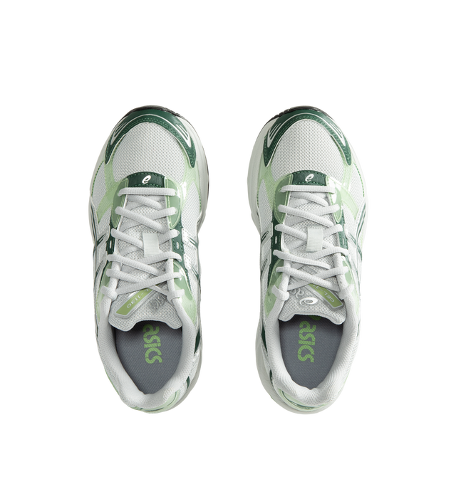 Image 5 of 5 - GREEN - Asics Unisex Gel-1130 Sneakers feature patent leather overlays, clear gloss TPU accents, and breathable mesh underlays for a modern look. Enhanced with cushioning and support designed for all-day comfort, the GEL-1130 delivers the perfect blend of heritage performance and everyday wearability. Main Material: Mesh Upper with Patent Leather and Gloss TPU Overlays. Cushioning: GEL Technology. Details: GEL-1000 Series Heritage Design, Breathable Mesh Construction *Unisex style in men's si