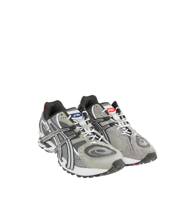 Image 2 of 5 - GREY - ASICS Gel-Nimbus 10.1 Sneaker featuring mesh upper, synthetic overlays, padded collar, Gel-Nimbus branding on tongue, formstripes on lateral sides, ASICS branding on lateral ankle, rope laces, branding on heel, GEL technology inserts, TRUSSTIC system, dual-layer EVA foam midsole and rubber outsole.