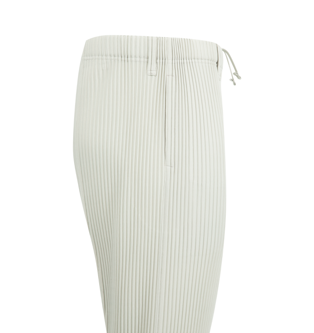 Image 3 of 3 - GREY - ISSEY MIYAKE Compleat Trousers featuring slim-fit, garment-pleated, belt loops, concealed drawstring at elasticized waistband, two-pocket styling, button-fly and central pinched seam at legs. 100% polyester. Made in Philippines.