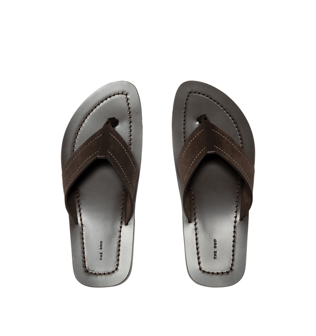 Image 4 of 4 - BROWN - The Row Mens Dan Flip Flop is crafted from calfskin suede. Feature a slip-on silhouette, lambskin leather lining, and calfskin leather sole. Main Material: Calfskin Suede; Lining: Lambskin Leather; Sole: Calfskin Leather. Made in Italy.
