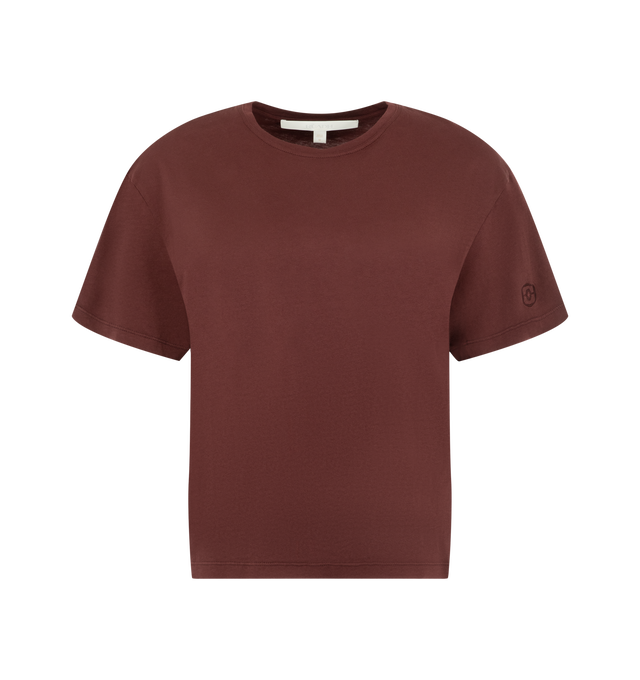 Image 1 of 2 - RED - Radh Women's The Laurent T-Shirt is crafted from lightweight organic cotton and features a classic crewneck silhouette with a soft, fluid hand feel. Cut for an easy, understated fit, this designer essential is refined in proportion for everyday versatility and finished with discreet Radh emblem embroidery at the sleeve. Main Material: Organic Cotton.