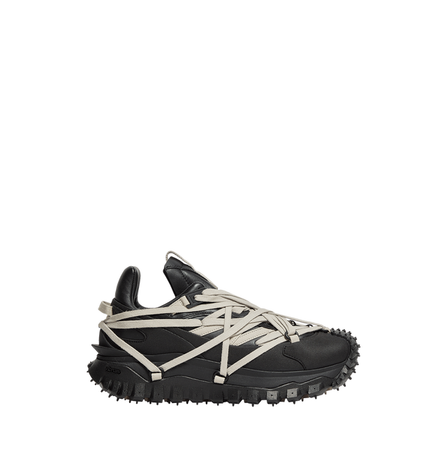 Image 1 of 1 - BLACK - RICK OWENS X MONCLER Trailgrip Megalace Leather Sneakers featuring leather, mesh lining, MEGALACE closure, TPU spoiler, EVA midsole, carbon fiber between midsole and tread, Special Vibram MEGAGRIP rubber compound and OrthoLite insole. Sole height 4.5 cm. 100% polyamide/nylon. Sole: 100% elastodiene.
