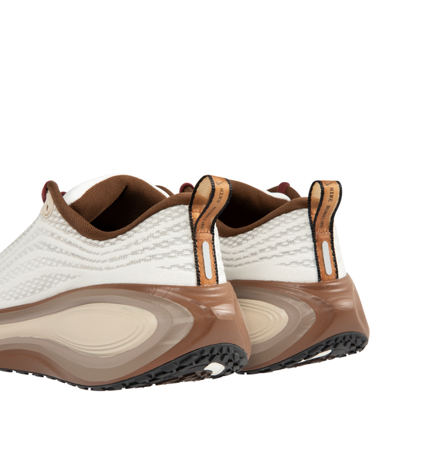 Image 3 of 5 - NEUTRAL - DO NOT UPLOAD AS PER RICK 12/9NIKE Vomero Plus Sneaker featuring mixed textile upper, ultra-responsive ZoomX cushioning, high-abrasion rubber outsole, webbed lace loops for an adjustable fit and reflective details.