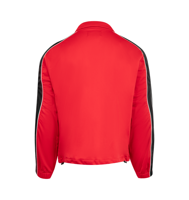 Image 2 of 3 - RED - NAHMIAS Zip Up Track Jacket featuring zip up front closure, side pockets, logo on chest and stripe down sleeves. 100% nylon.